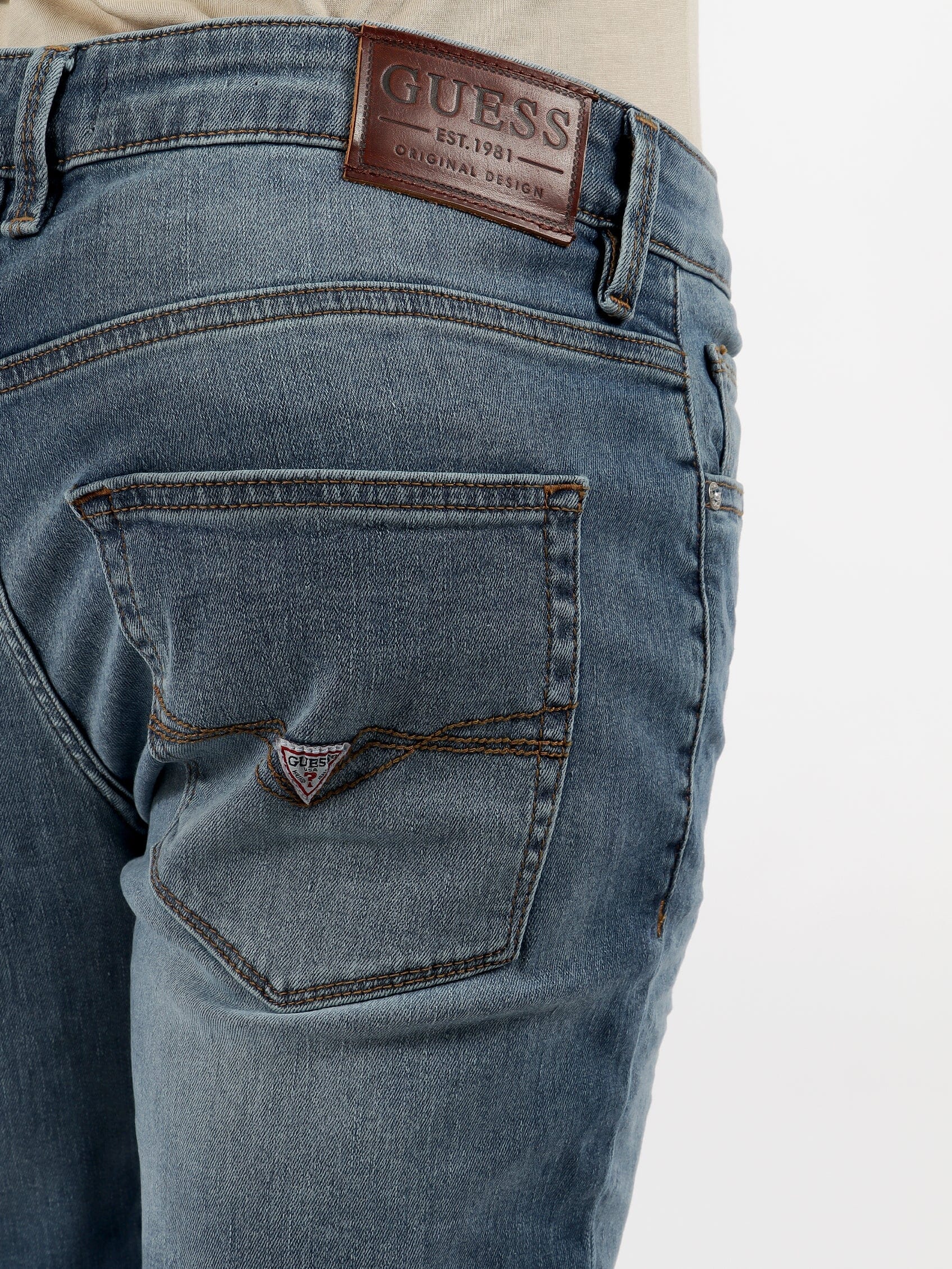 Guess Mens Logan Skinny Jeans Light Wash | Guess