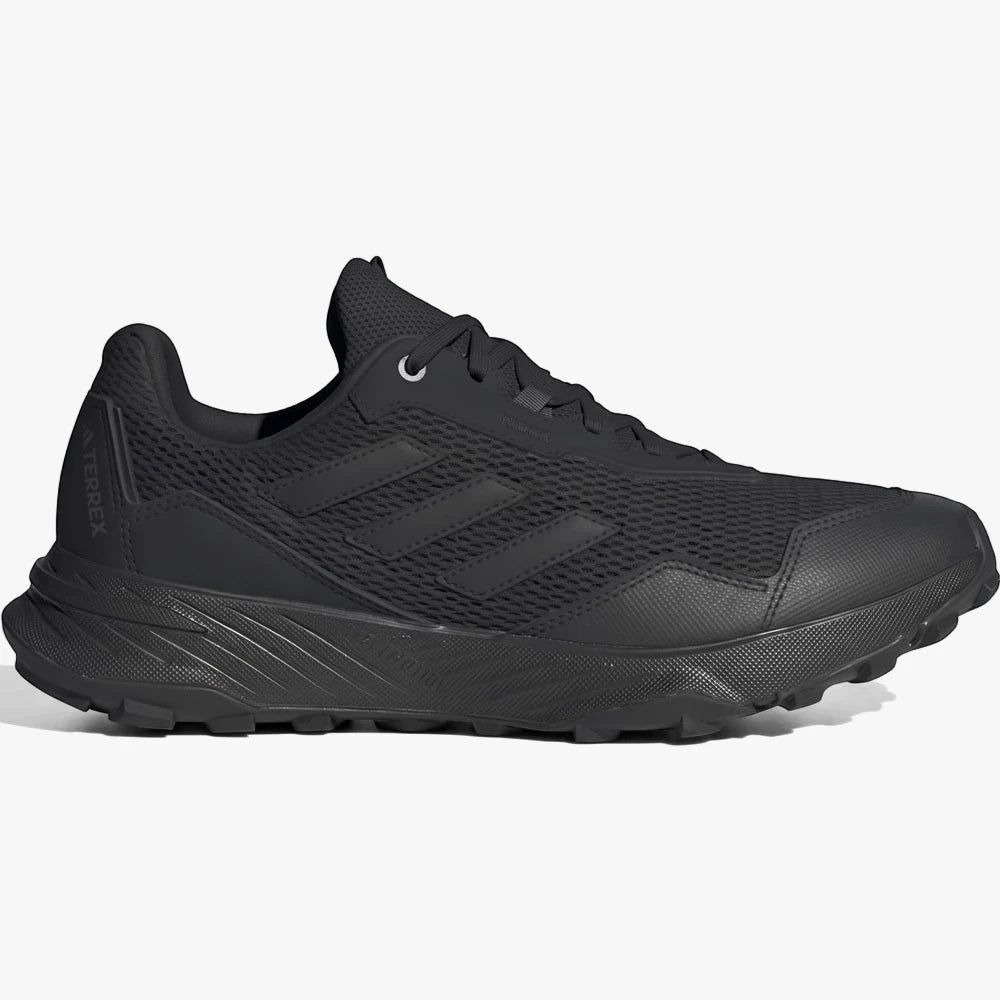 Adidas Mens Tracefinder Trail Sneaker in black, featuring a mesh upper, three stripes logo, and durable lugged outsole,