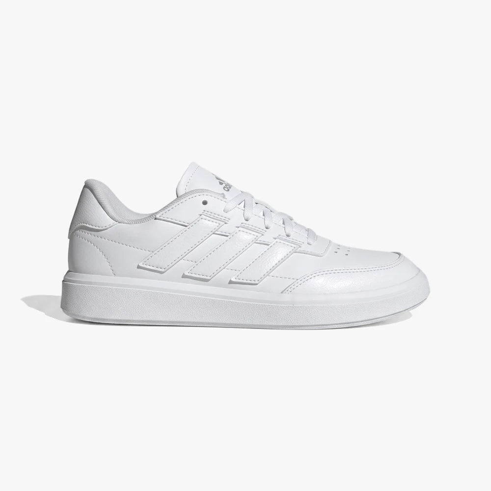 White Adidas Womens Courtblock sneaker with three side stripes, shown in a side view on a white background.