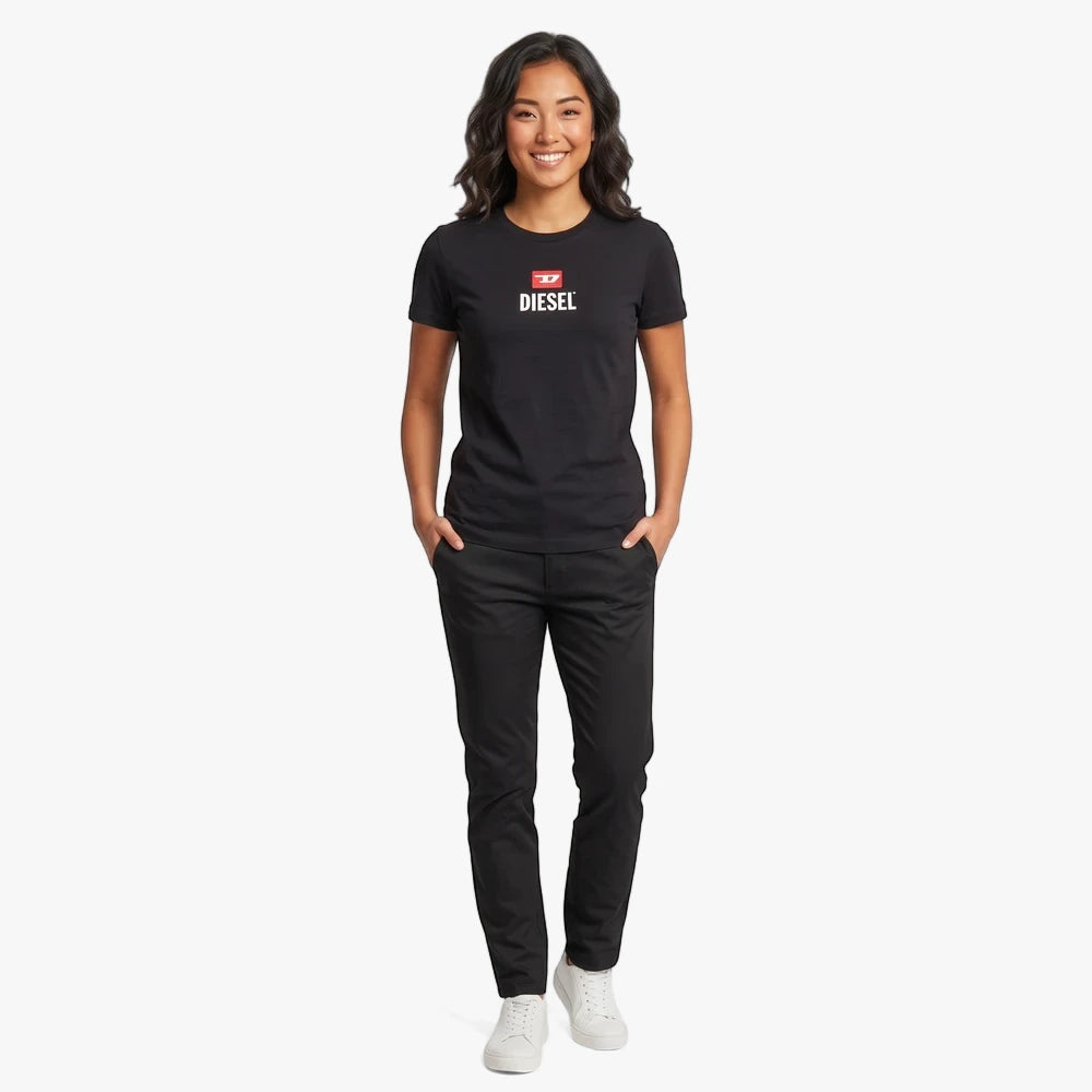 A woman wears a black Diesel Womens Just Small New D Logo Tee and black pants, showcasing the shirt&