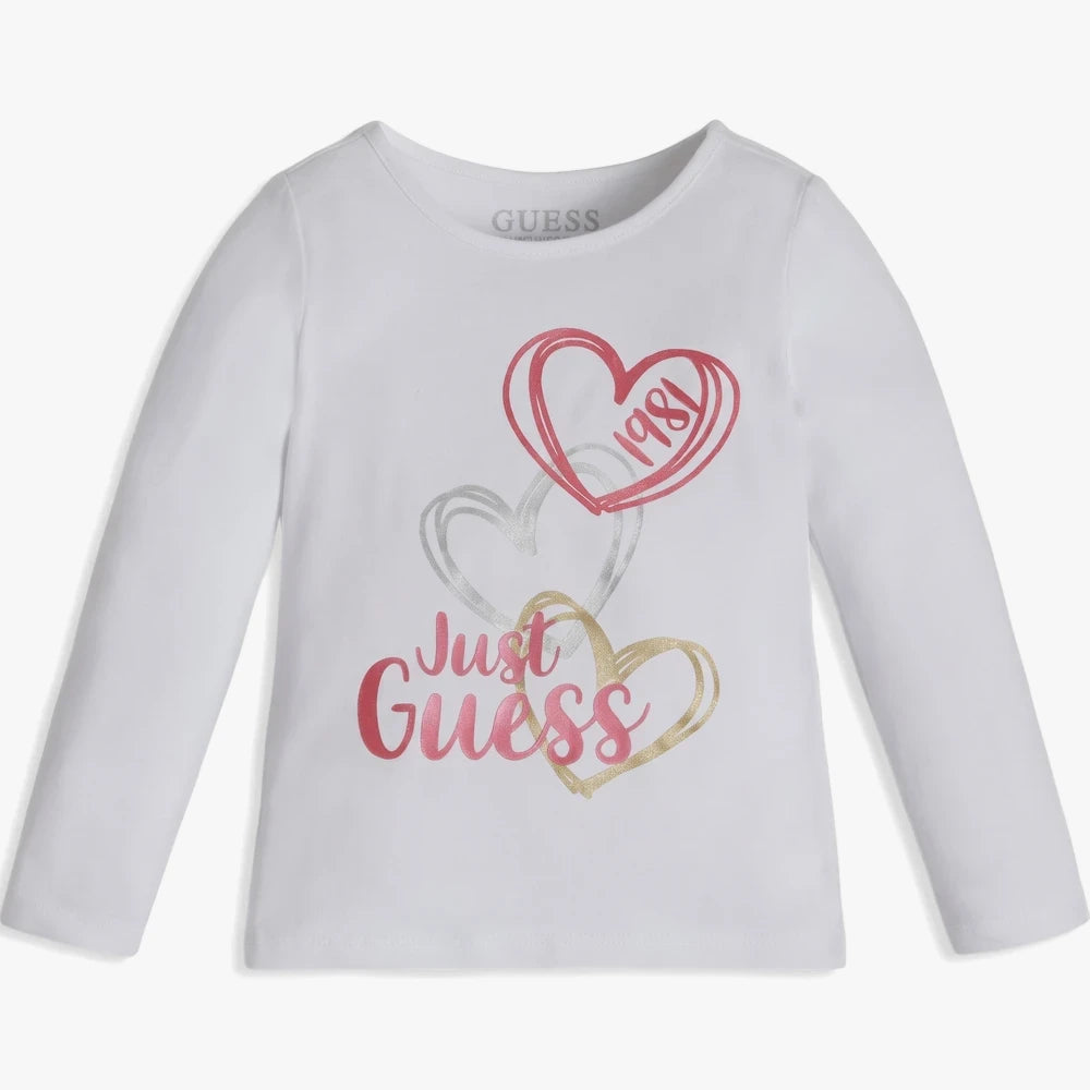 White Guess girls long sleeve tee featuring red, silver, and gold heart graphics with &