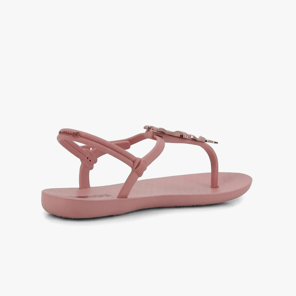 Pink Ipanema Womens Class Charming Sandal, shown from a side-rear view, featuring a thong strap with a decorative butterfly