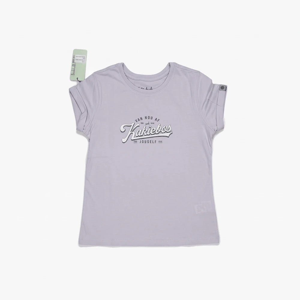 Kakiebos Womens Classic Fit Short Sleeve Tee in galactic lilac, featuring a front graphic print, displayed in a flat lay.