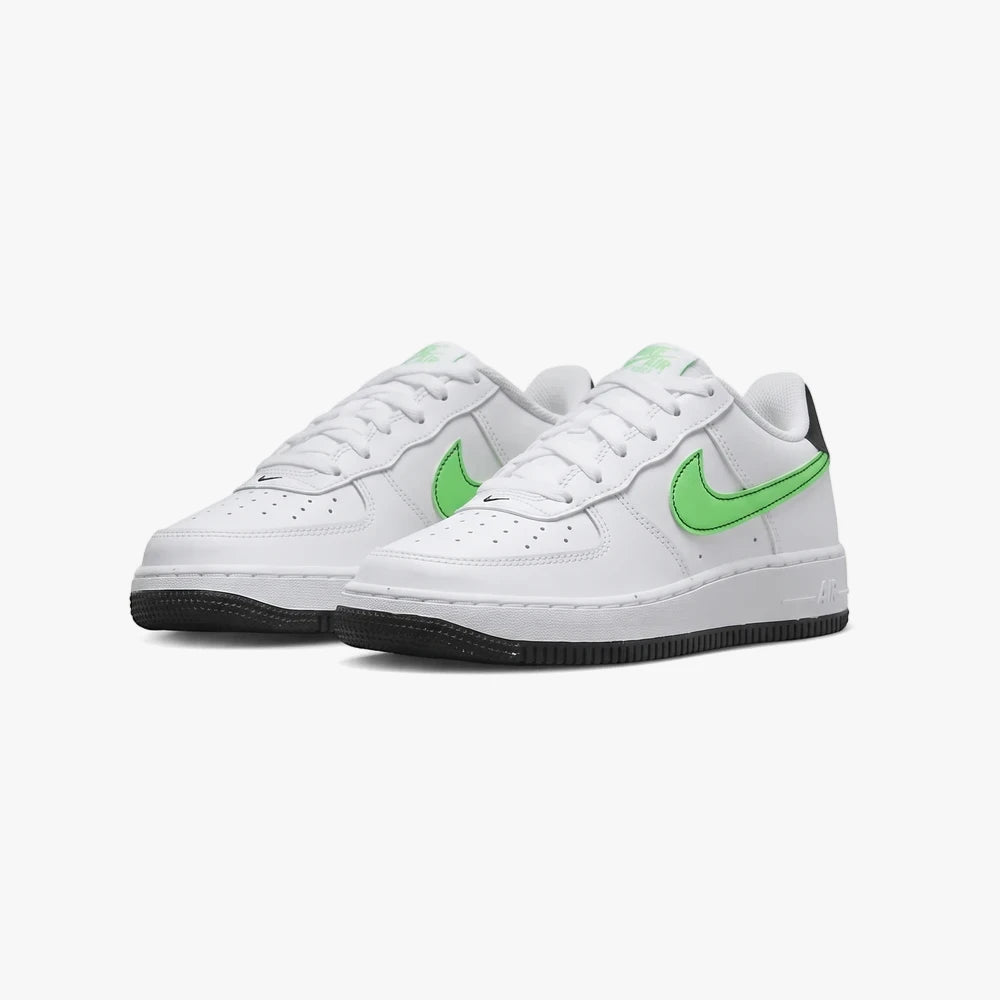 Two white Nike Kids Air Force 1 sneakers with bright green swooshes and black outsoles, displayed from a side-front view.