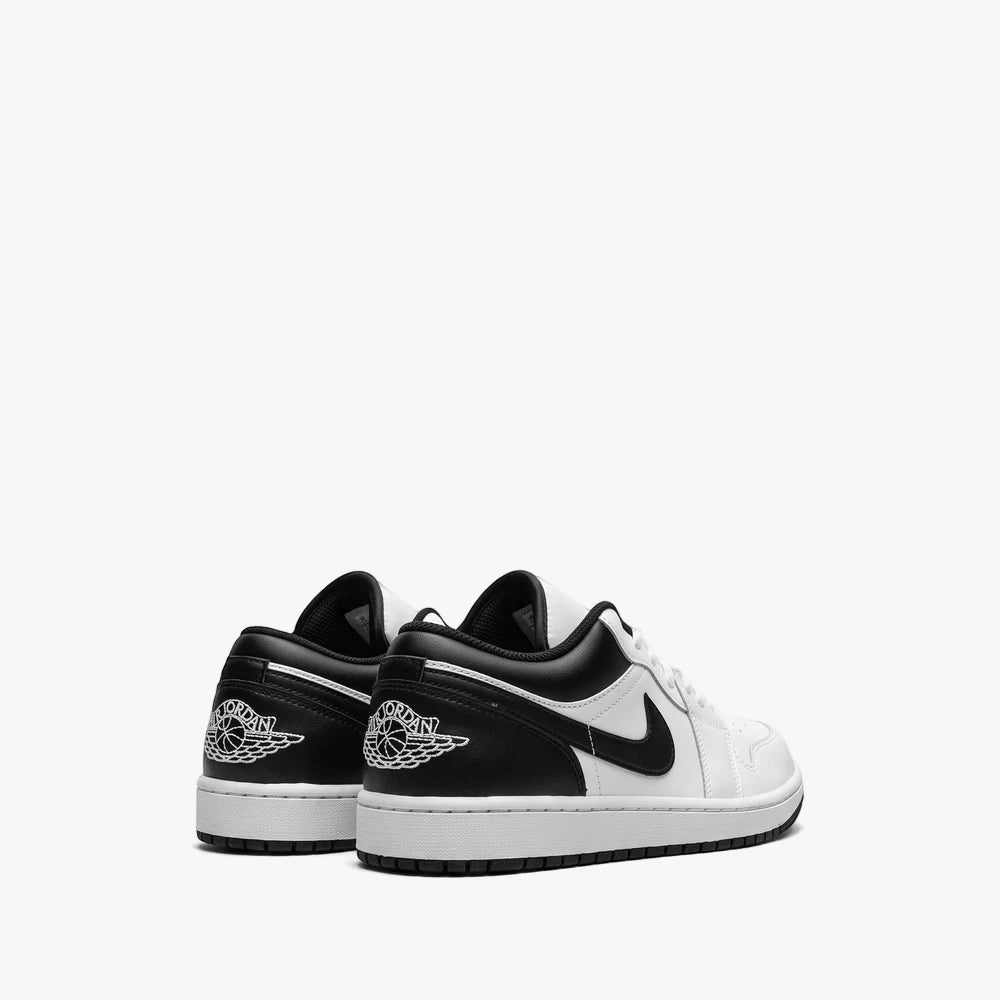 Nike Mens Air Jordan 1 Low sneakers in black and white, seen from the rear view, showcasing the iconic design.