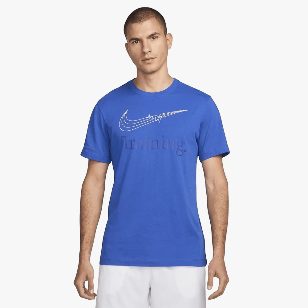 A male model wearing a royal blue Nike Dri-FIT training short-sleeve tee with a white swoosh logo and white athletic shorts.