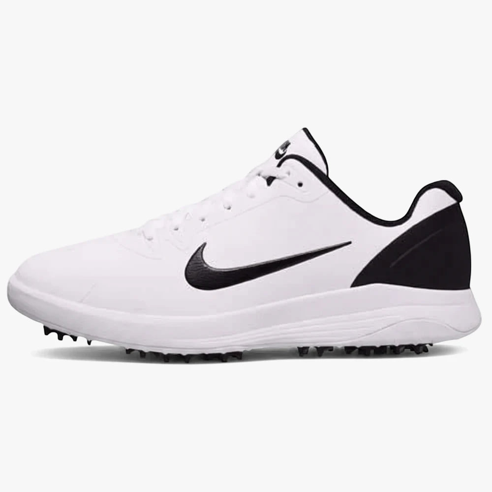 Side view of a white Nike Mens Infinity Golf Sneaker with black swoosh logo, black heel accent, and visible sole spikes.