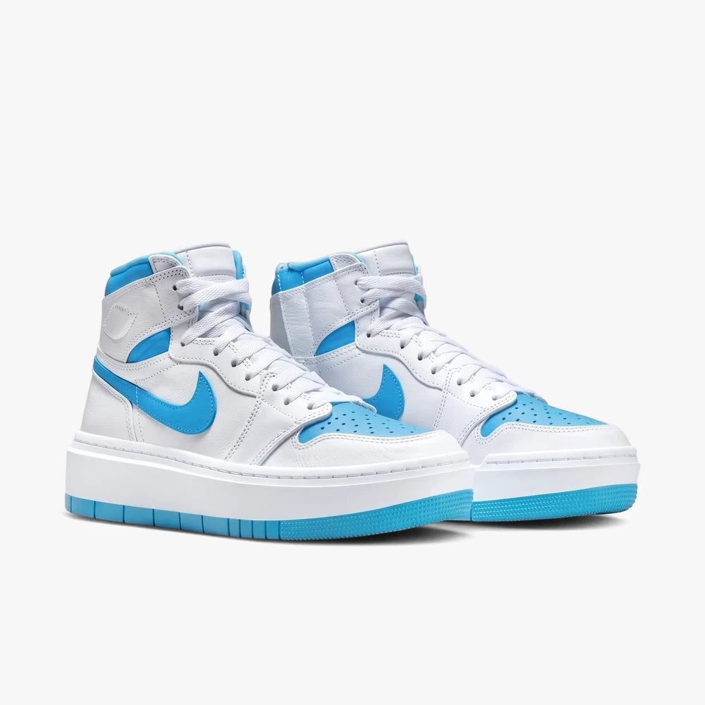 A pair of white and blue Nike Womens Air Jordan 1 Elevate High sneakers with a platform sole, shown from a side angle.