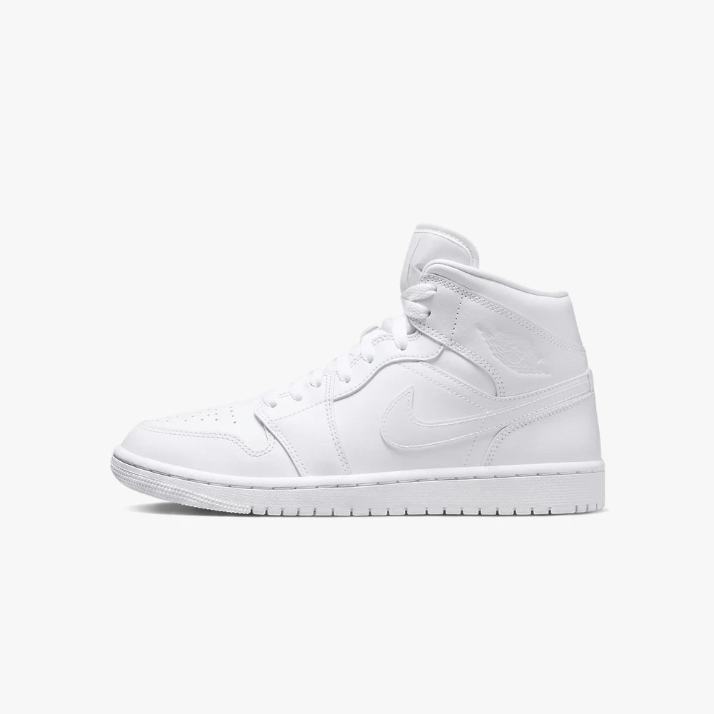 White high-top Nike Womens Air Jordan 1 Mid sneaker, side view, showcasing its clean leather design and iconic branding.