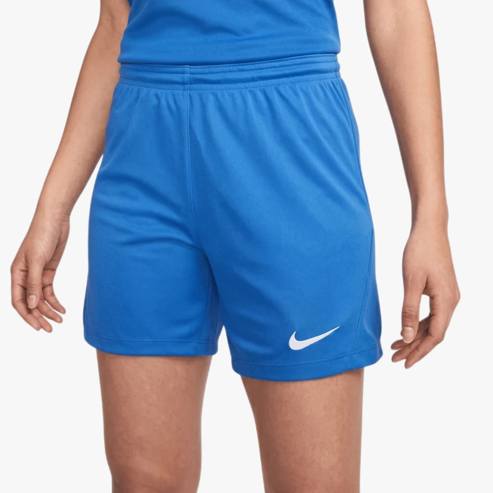 A person wears royal blue Nike Women&