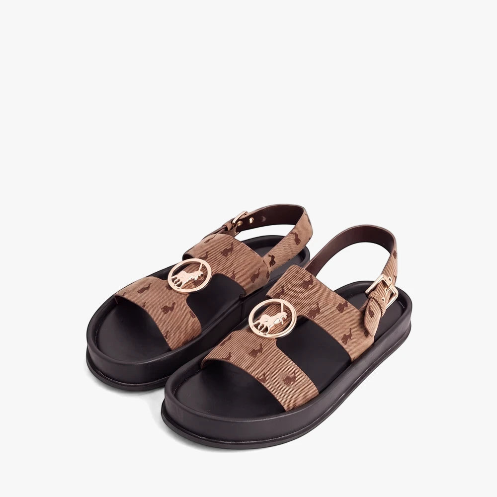 A pair of brown Polo Womens Moulded Trim Sandals with patterned fabric straps, gold-tone horse logo trim, and black platform