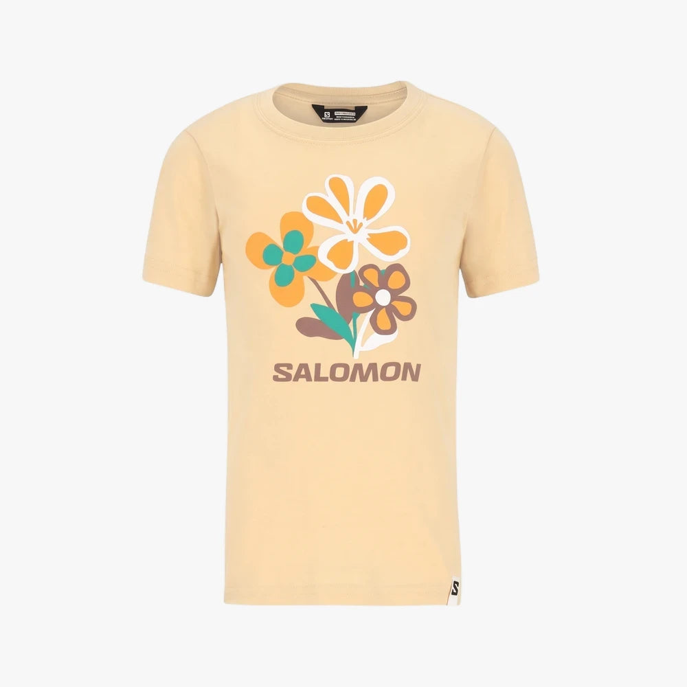 Salomon Girls Wildheart Tee in pineapple slice (beige) color, featuring a colorful floral graphic print on the front.