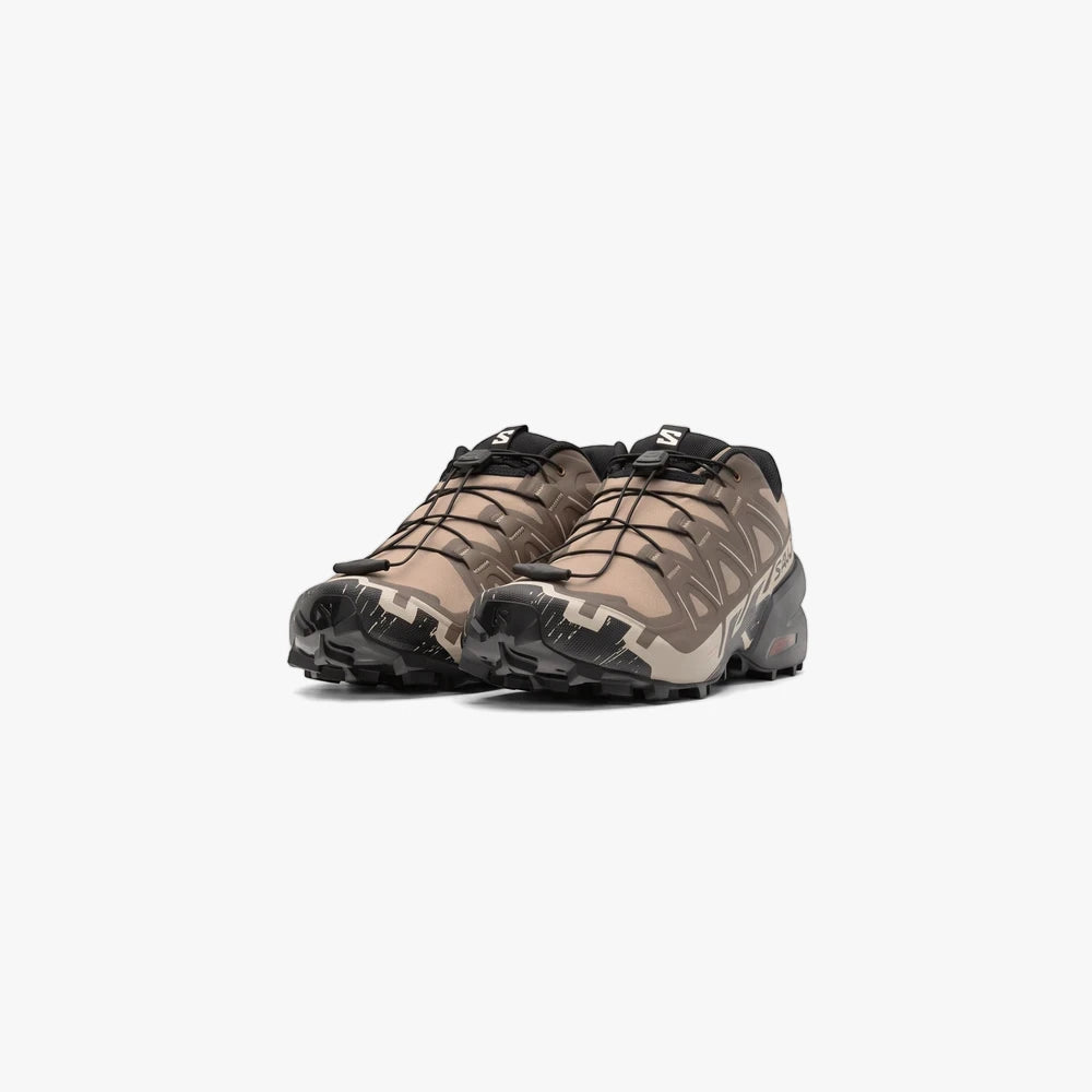 Salomon Mens Speedcross 6 trail sneakers in natural, black, and almond milk camouflage colorway, shown from a slightly