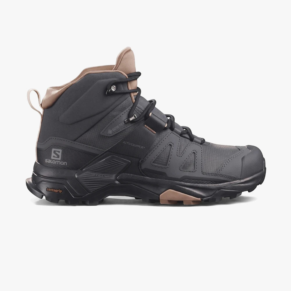 Salomon Womens X Ultra 4 Mid Gore Tex Hiking Boot in ebony, mocha mousse, and almond cream, designed for rugged outdoor use.