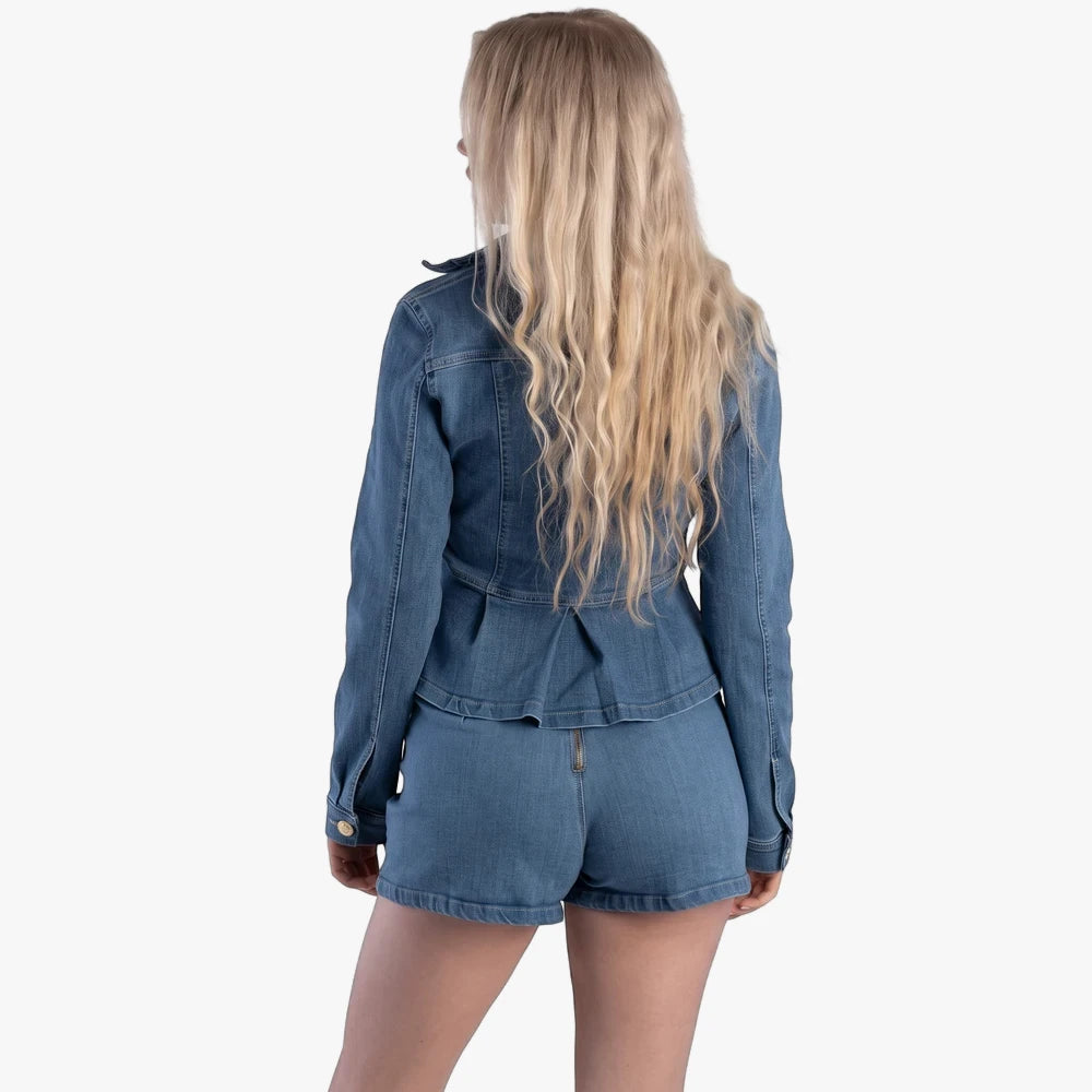 Sissy Boy High Waist Flat Front Shorts in Light Vintage denim, seen from the back on a woman, paired with a denim jacket.