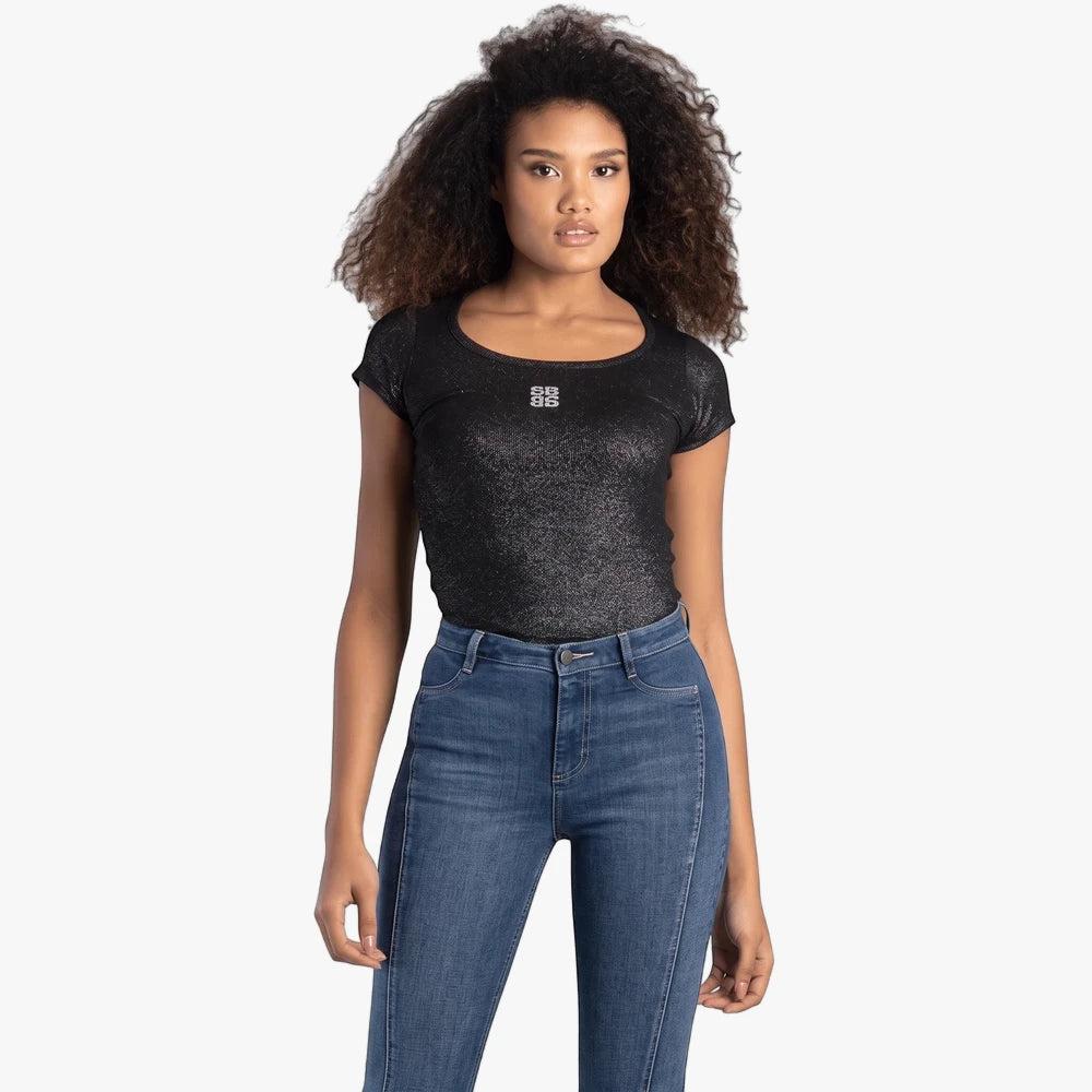A woman models a black Sissy Boy Future Lover short sleeve fashion top with shimmery fabric and scoop neck, paired with blue