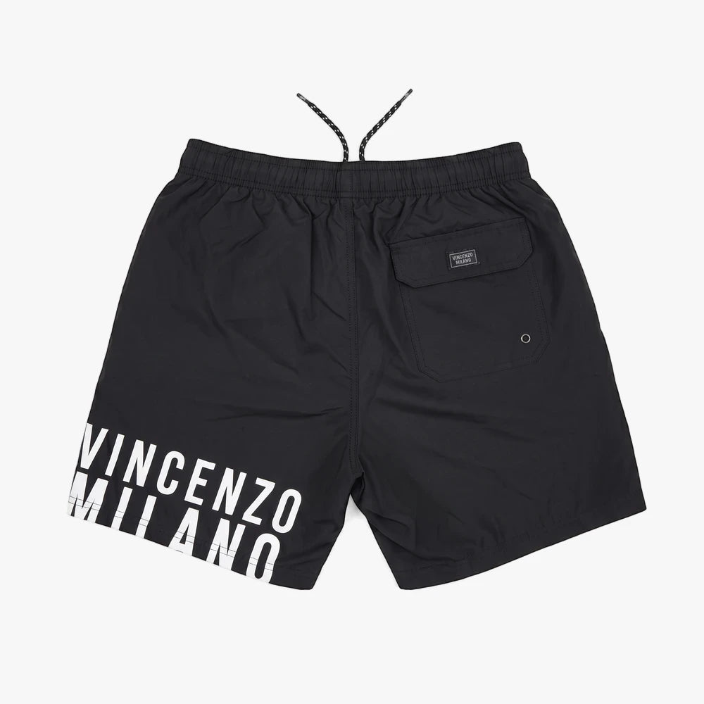 Black Vincenzo Milano mens swim shorts, flat lay, shown from the back with a white logo print on the leg.