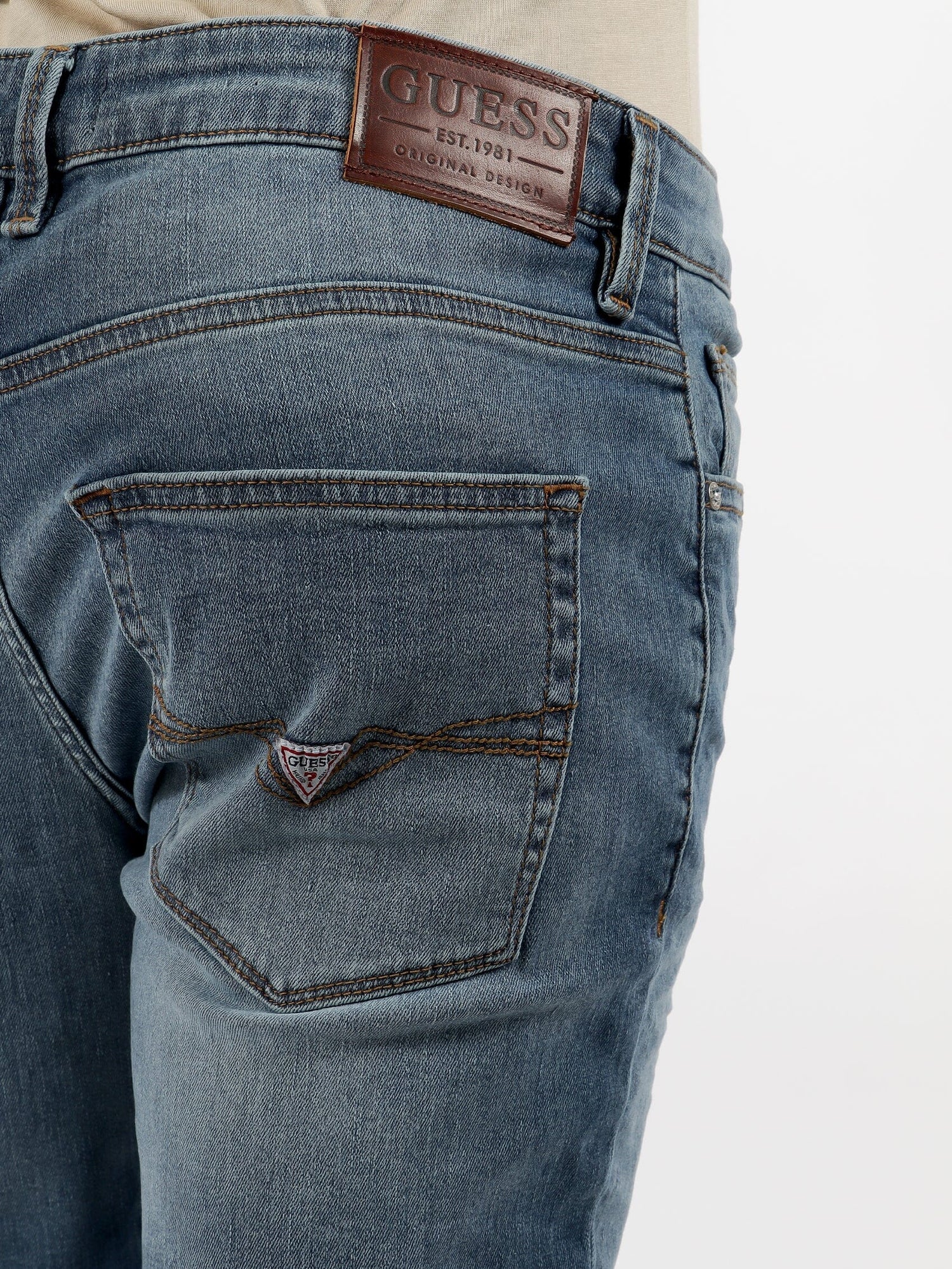 Guess Mens Logan Skinny Jeans Light Wash | Guess