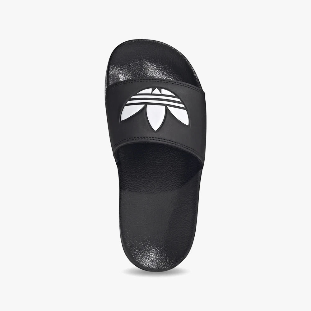 Black Adidas Adilette Lite slide with a white Trefoil logo on the strap, viewed from directly overhead.