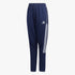 Adidas Boys Navy Track Pants with white stripes, featuring an elastic waistband and athletic fit, shown standing upright.