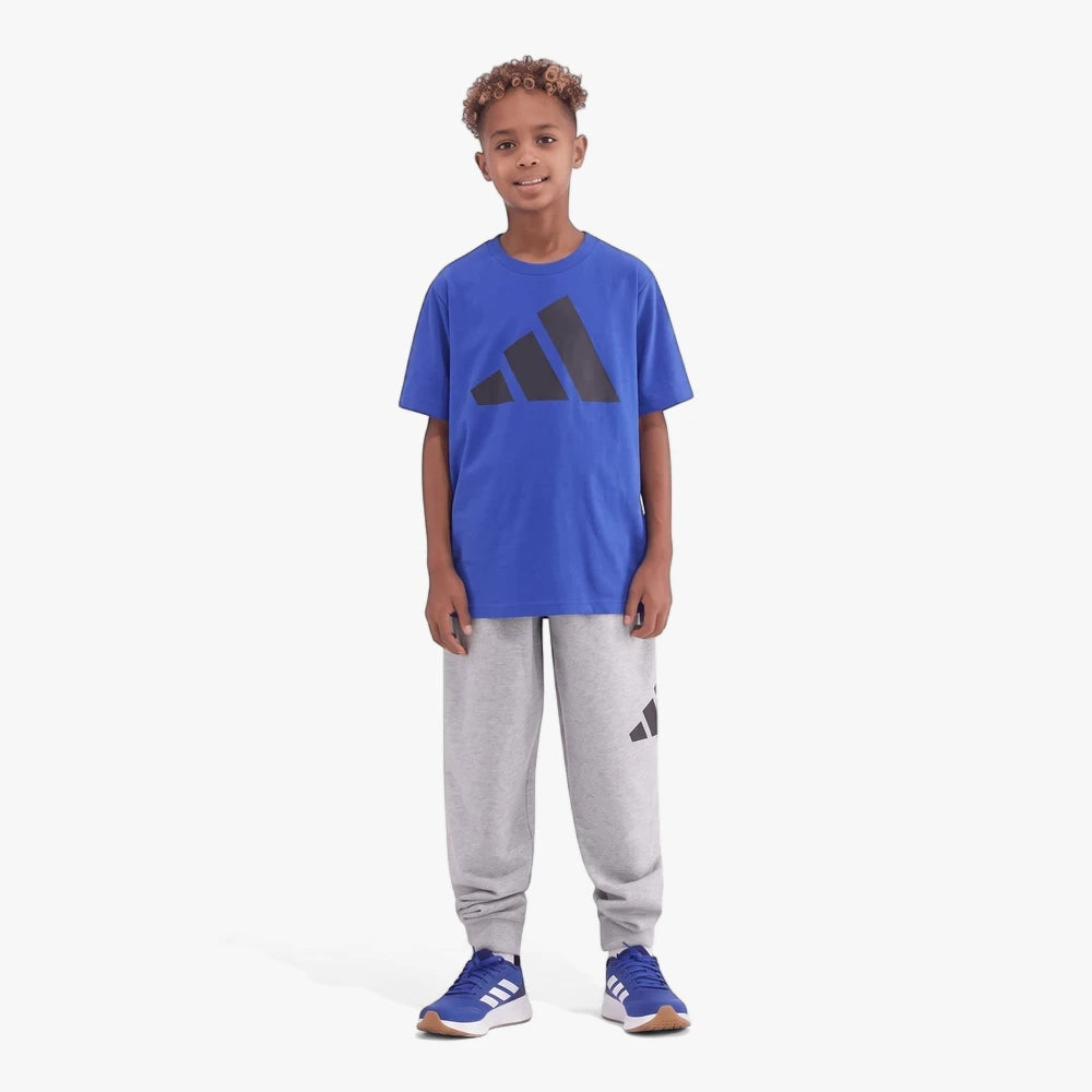 Adidas boys short sleeve tee in roy blue with large dark logo, front view shows a comfortable cotton t-shirt for kids.