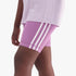 Close-up of Adidas Girls 3S Tigh Shorts in purple with distinctive white three-stripe detailing, worn by a child.