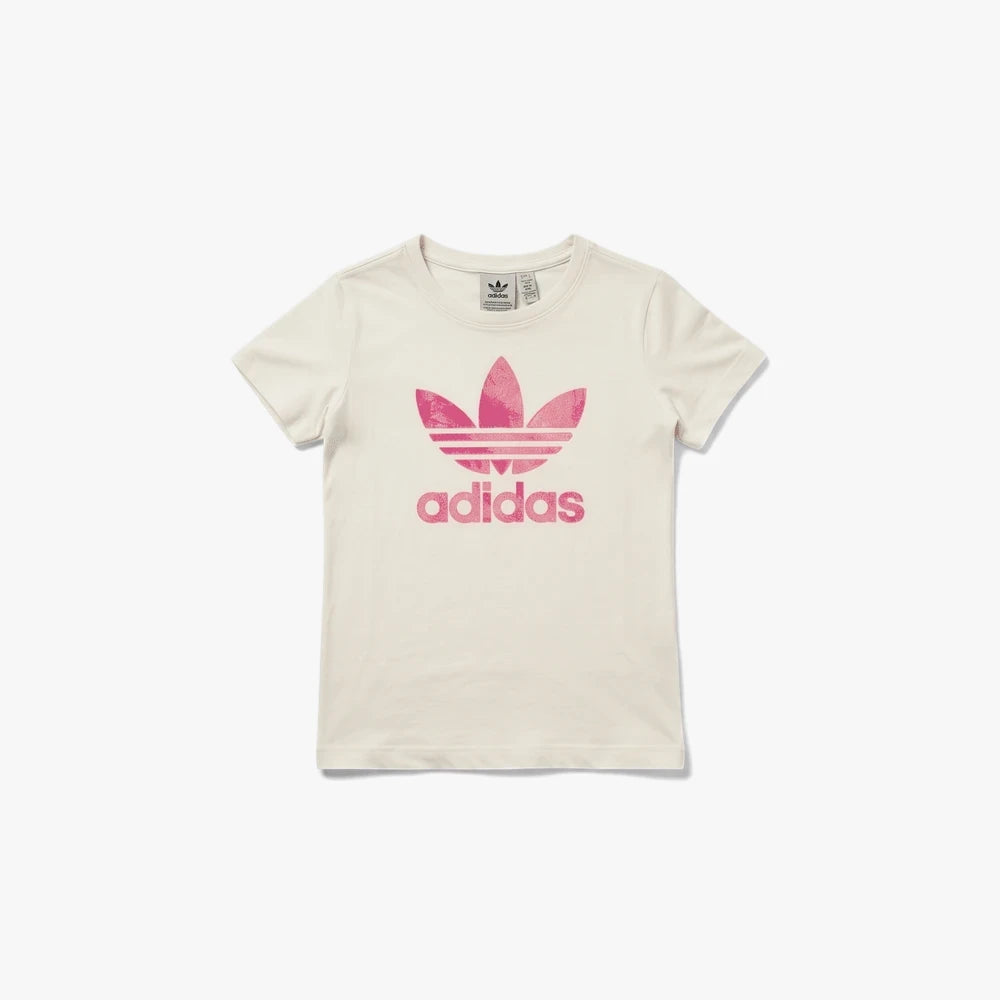 Adidas Girls Logo Play Tee in cream white with a pink trefoil logo, short sleeve, shown in a flat-lay view.