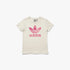 Adidas Girls Logo Play Tee in cream white with a pink trefoil logo, short sleeve, shown in a flat-lay view.