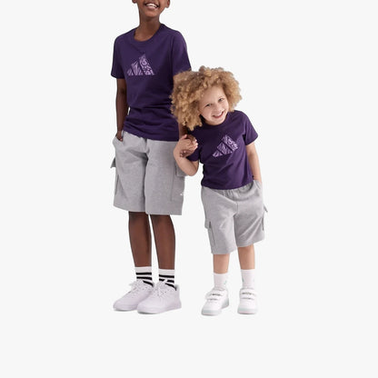 Two boys in matching purple Adidas Kids Animal Short Sleeve Tees, grey cargo shorts, and white sneakers, standing together.
