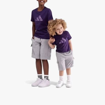 Two boys wearing matching purple Adidas Kids Animal Short Sleeve Tees and grey cargo shorts, smiling while holding hands.