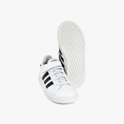 Adidas Kids Grand Court 2.0 El Sneaker in white with black stripes, featuring a Velcro strap and laces, displayed from a