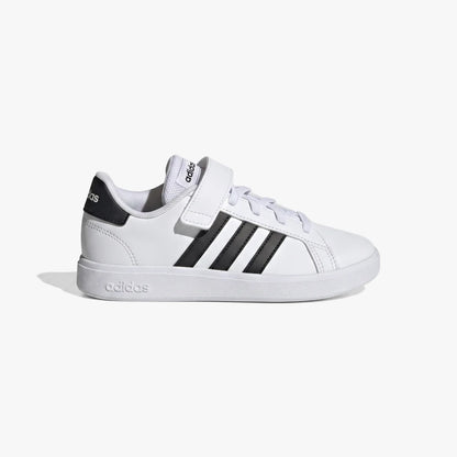 Adidas Kids Grand Court 2.0 El sneaker in white with black stripes, white laces, and a velcro strap, viewed from the side.