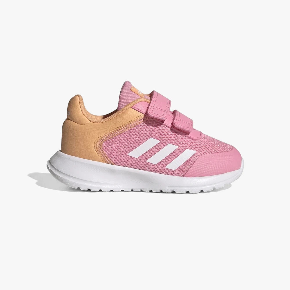 Adidas Kids Tensaur Run 2.0 Sneaker in pink with white stripes and velcro straps, featuring a peach heel, side view.