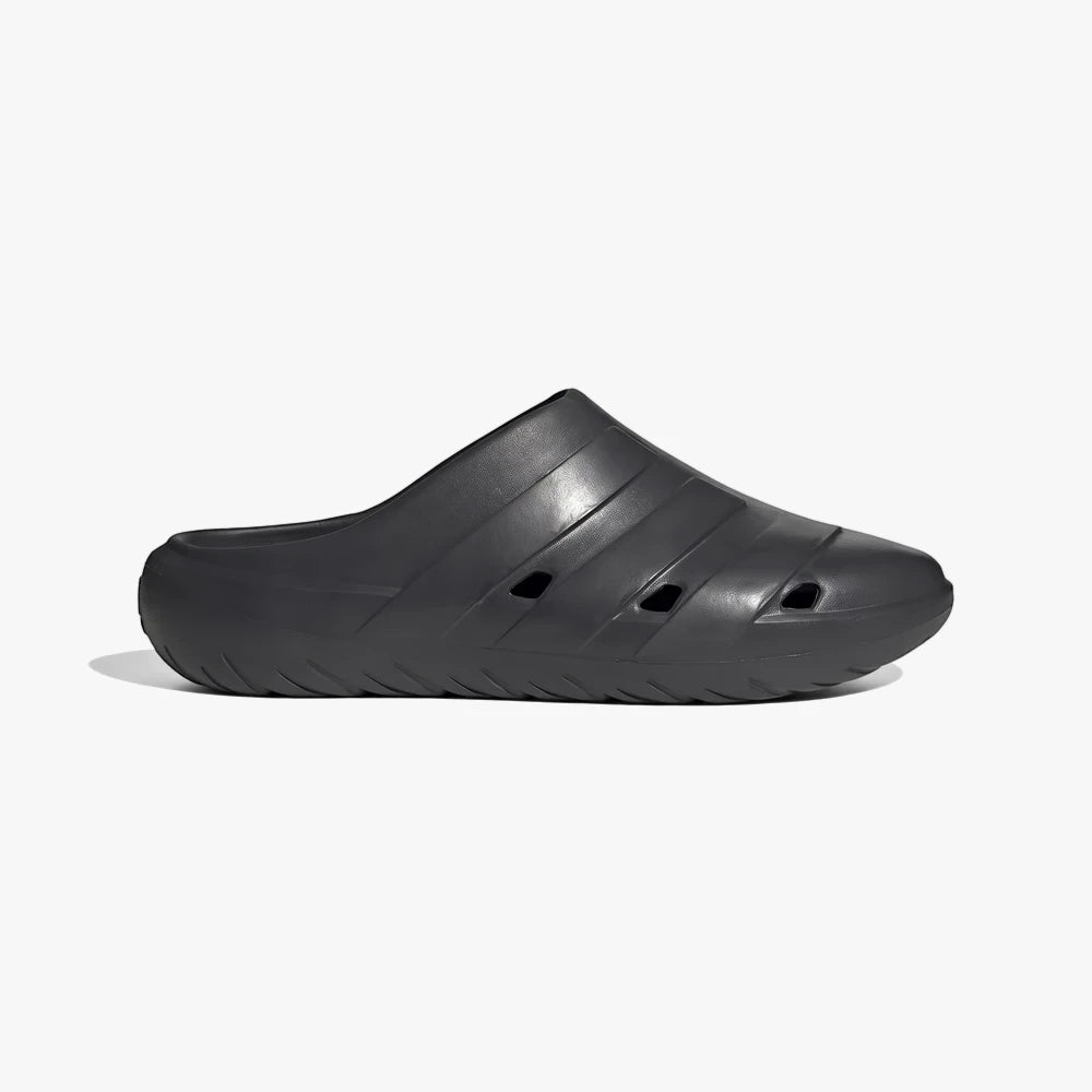 Single dark grey Adidas Mens Adican Clog, made of lightweight foam with a ribbed upper and side ventilation holes, studio