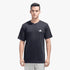 A male model wears a black Adidas Train Essentials short sleeve tee, featuring a white logo, paired with light grey shorts,
