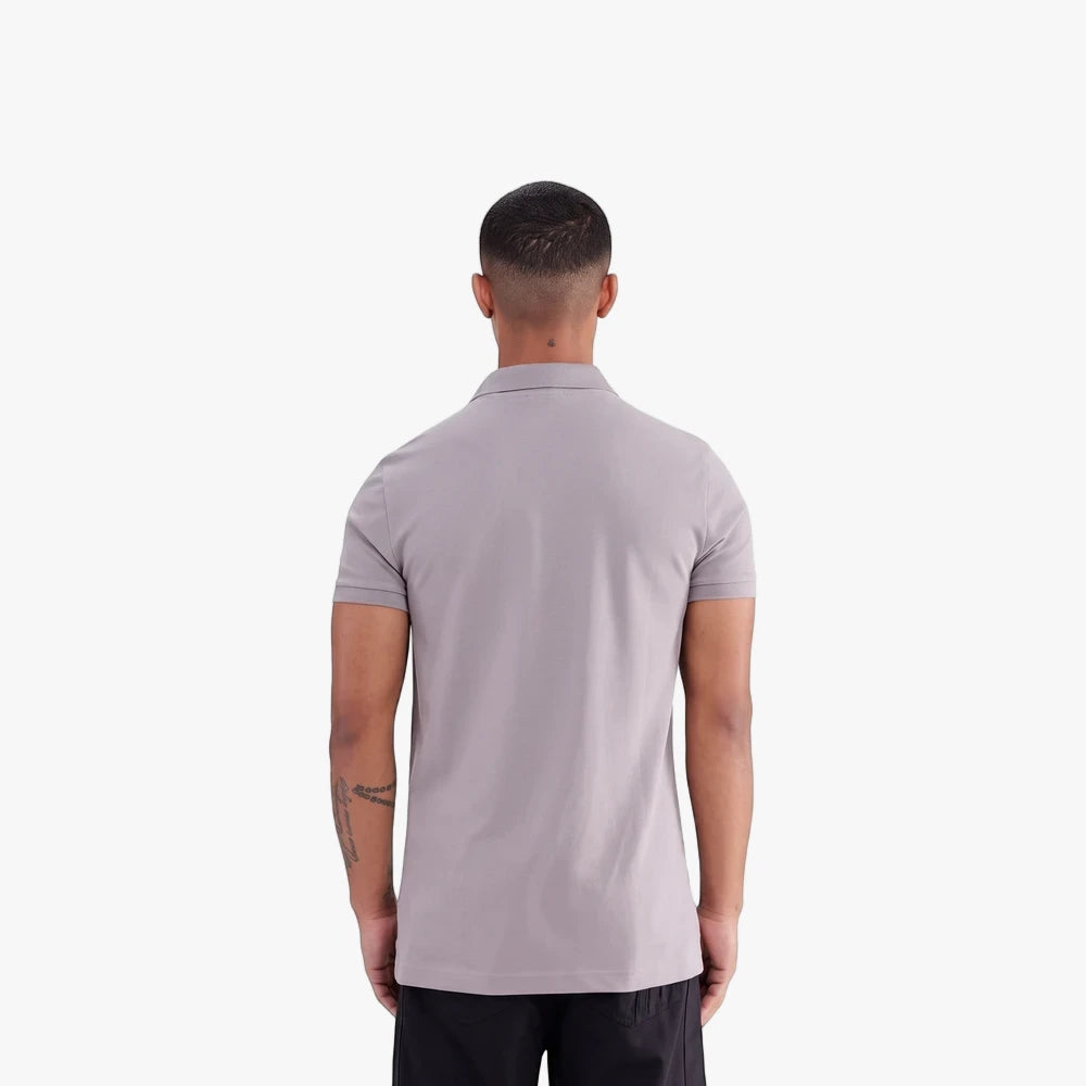Back view of a man wearing a grey Adidas Men&