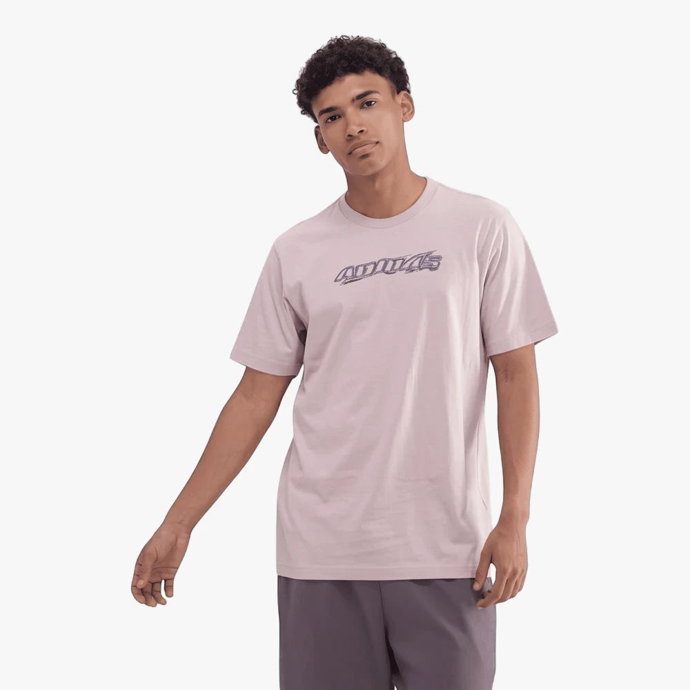 Male model wearing a light purple Adidas Mens Ts Fa W Short Sleeve Tee Wontau with a logo print and grey shorts.