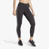 Adidas Womens 3 Stripe Tight Black leggings worn by a woman, featuring white iconic stripes and logo, in a cropped studio