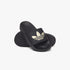 A pair of black Adidas Womens Adilette Lite Slides with a gold trefoil logo, casually arranged on a surface, offering