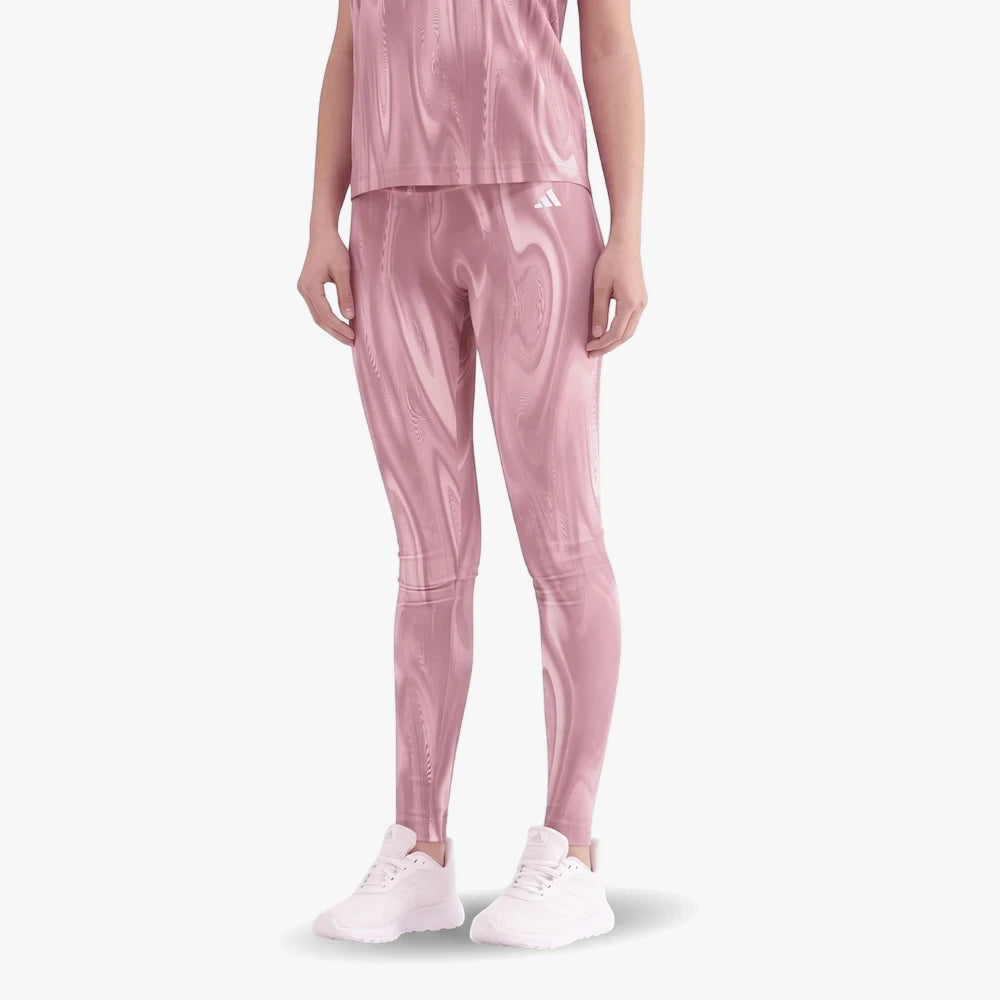 Adidas Womens Optime Full Length Print Leggings in sandy pink, featuring a unique swirling pattern, worn by a model.
