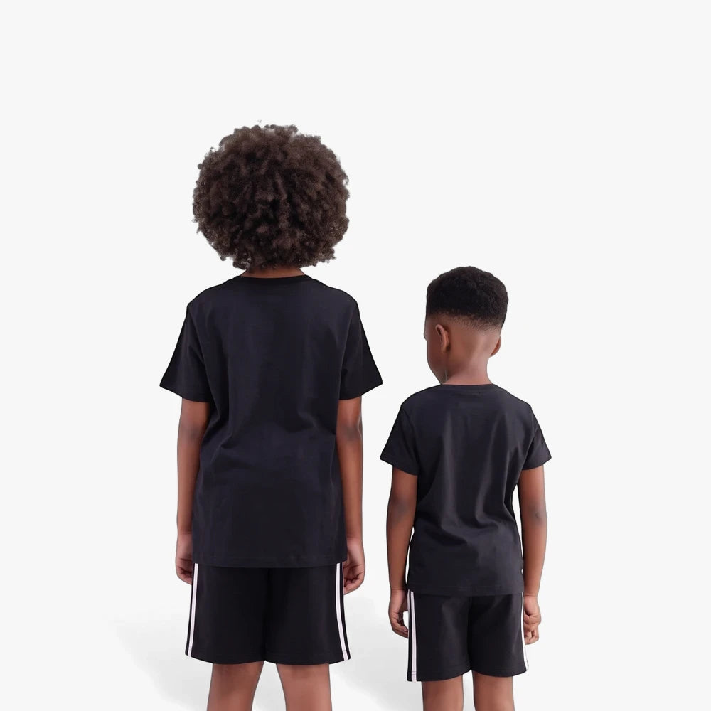 Two youth models seen from the back wearing black Adidas Essential short sleeve t-shirts and matching shorts with white