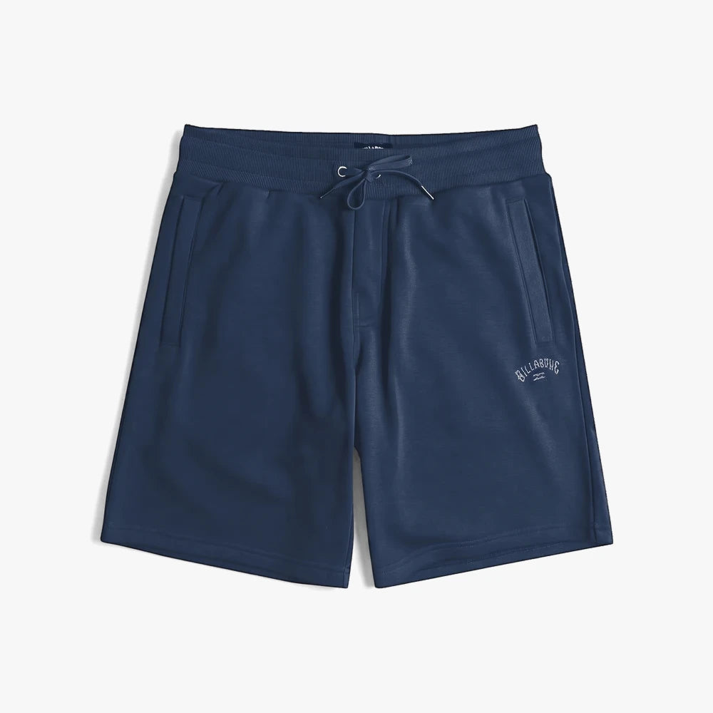 Billabong Boys Arch Shorts in navy blue, made from soft fleece fabric, with a white drawstring and printed logo, displayed