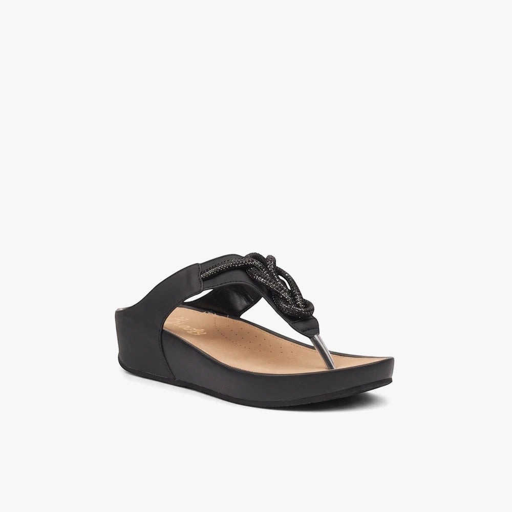 Black Butterfly Womens Delia 14 wedge sandal with a textured knotted strap, shown in a side view.