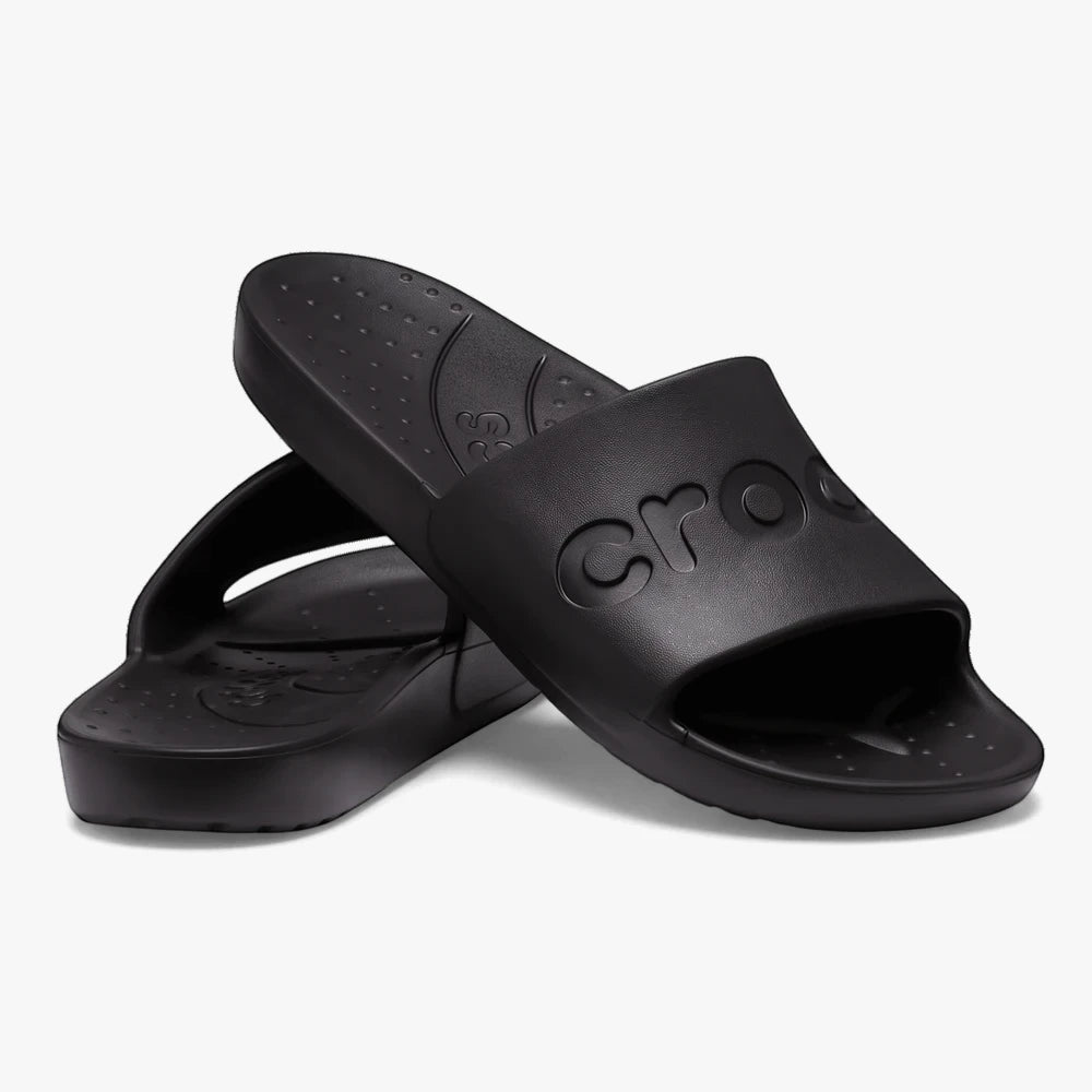 Pair of black Crocs Classic slides, showcasing the comfortable slip-on design and signature material, presented at an angle.