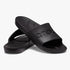 Pair of black Crocs Classic slides, showcasing the comfortable slip-on design and signature material, presented at an angle.