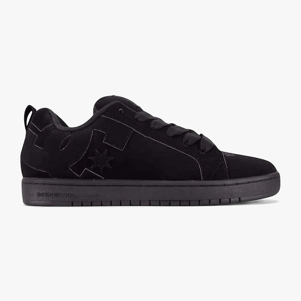A side view of a black Dc Mens Court Graffik skate shoe made of suede, featuring black laces and the distinctive DC star