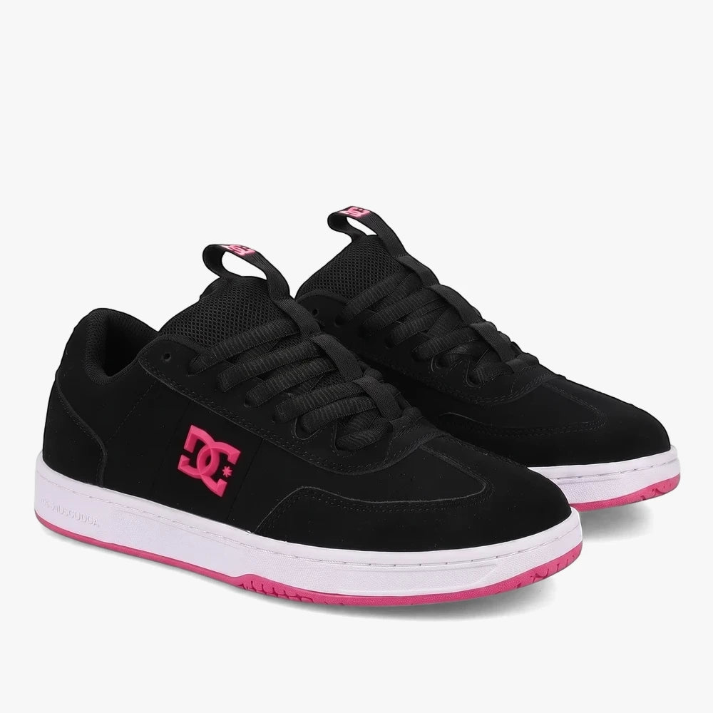 Pair of black and pink DC Womens Astrix sneakers, showcasing their suede and mesh upper with a white midsole and pink