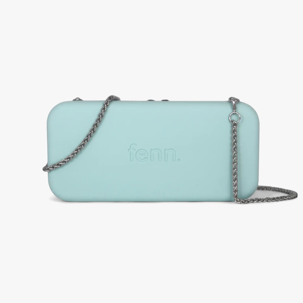 Fenn Wallet in aqua silicone, featuring a silver chain strap and subtle embossed logo, viewed from the front.