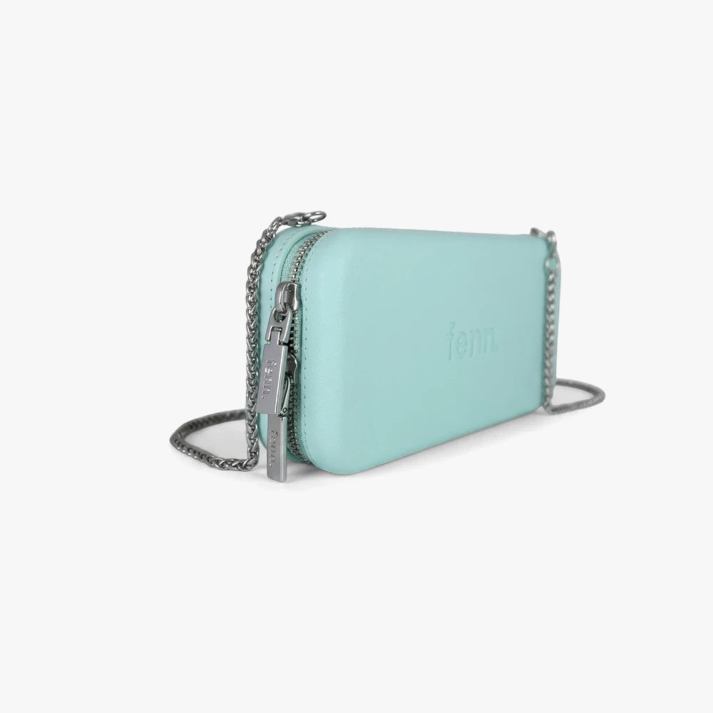 Aqua Fenn wallet with a silver zipper and silver chain strap, presented from an angled side view on a clean background.