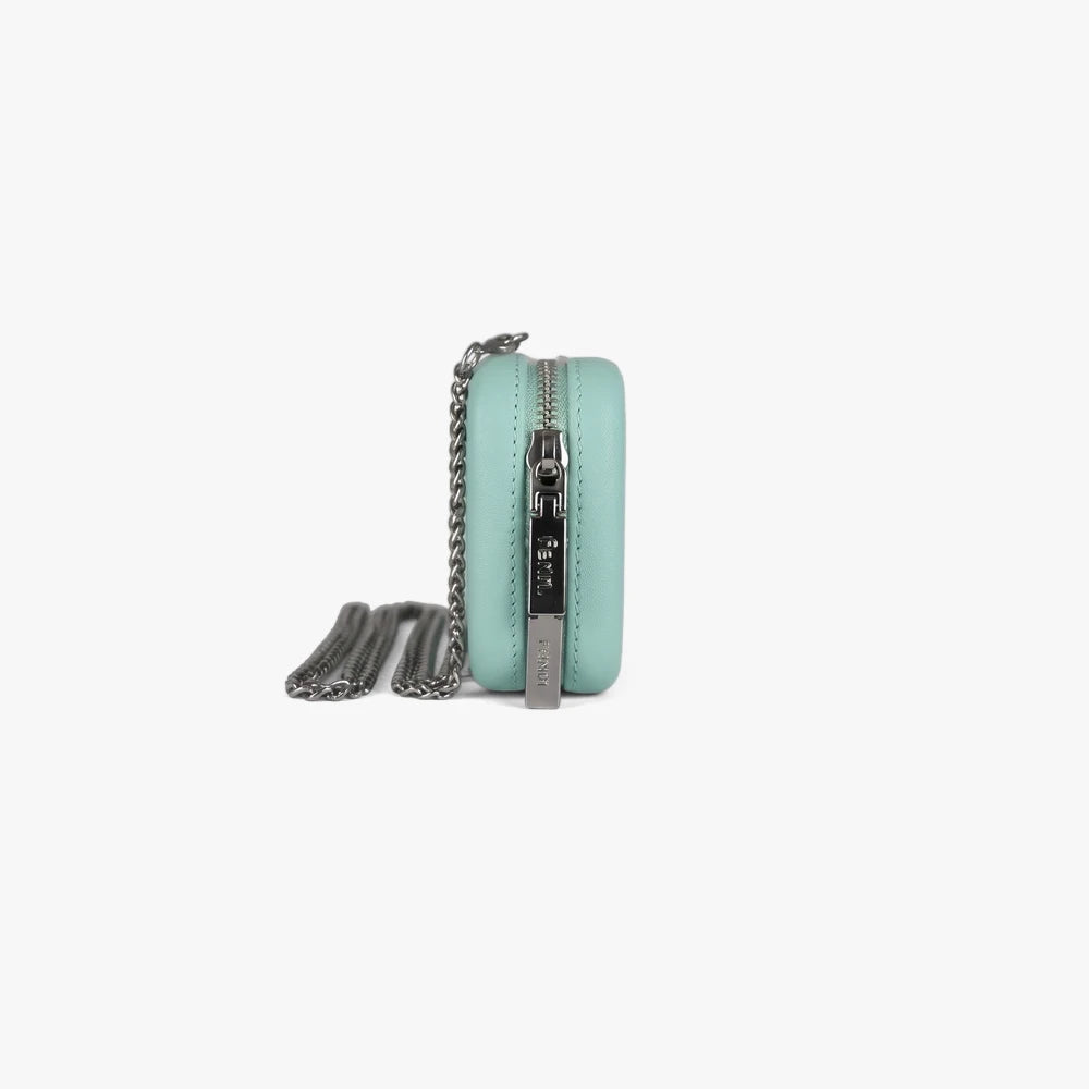 Aqua Fenn wallet with a silver zipper and chain, shown from a side view. This compact accessory features prominent silver